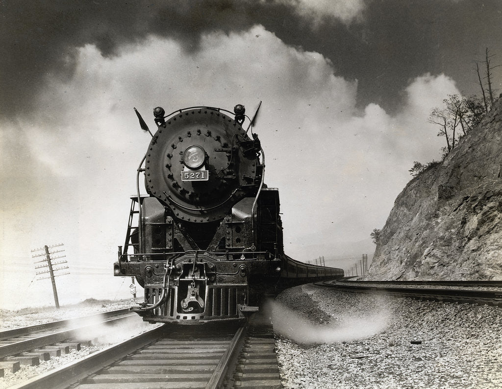 Detail of Steam Locomotive Chugging Down Track by Anonymous