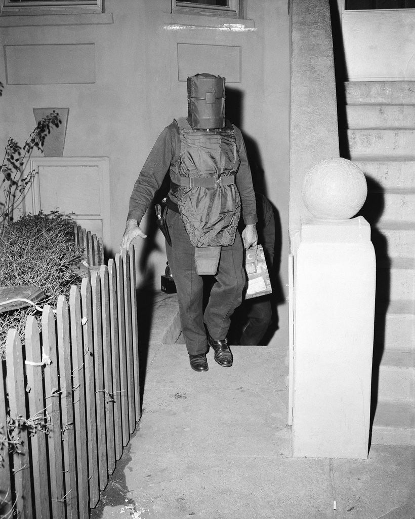 Detail of Policeman in Protective Gear Carries Bombs by Anonymous