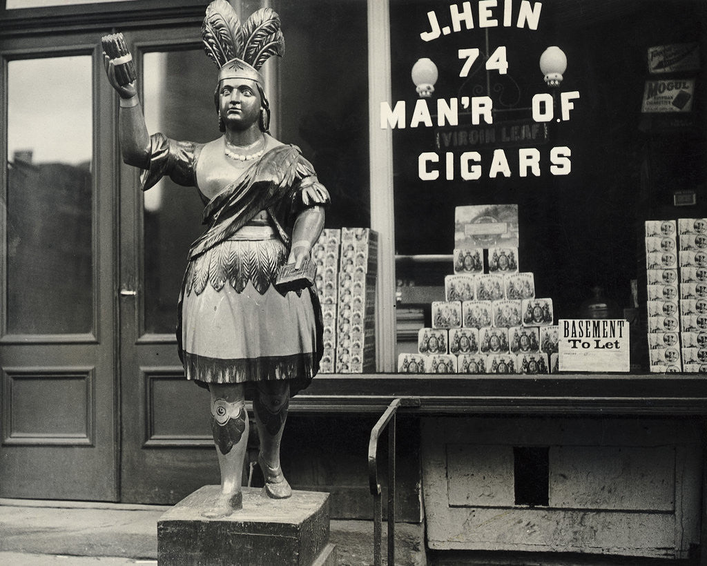 Detail of Wooden Statue In Front Of Cigar Shop by Anonymous