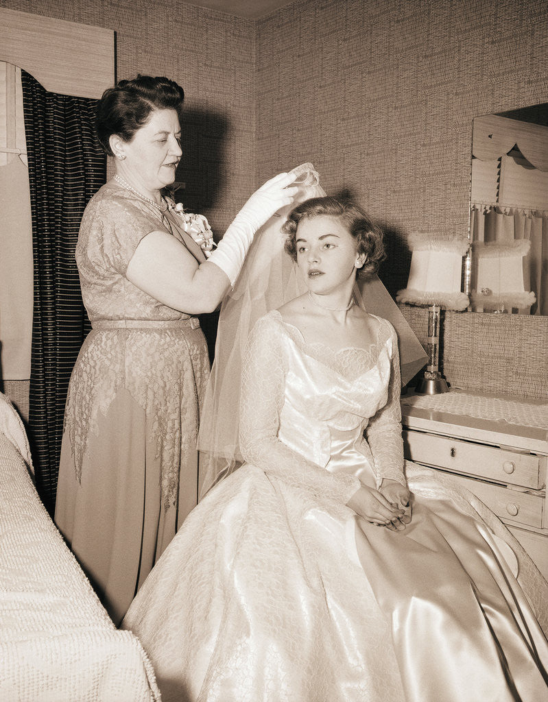Detail of Mother Putting Bridal Veil on Daughter by Anonymous