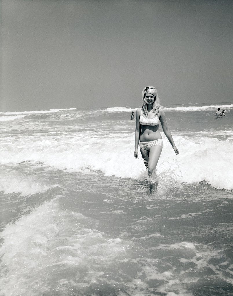 Detail of Woman Walks Out Of Ocean Surf by Anonymous