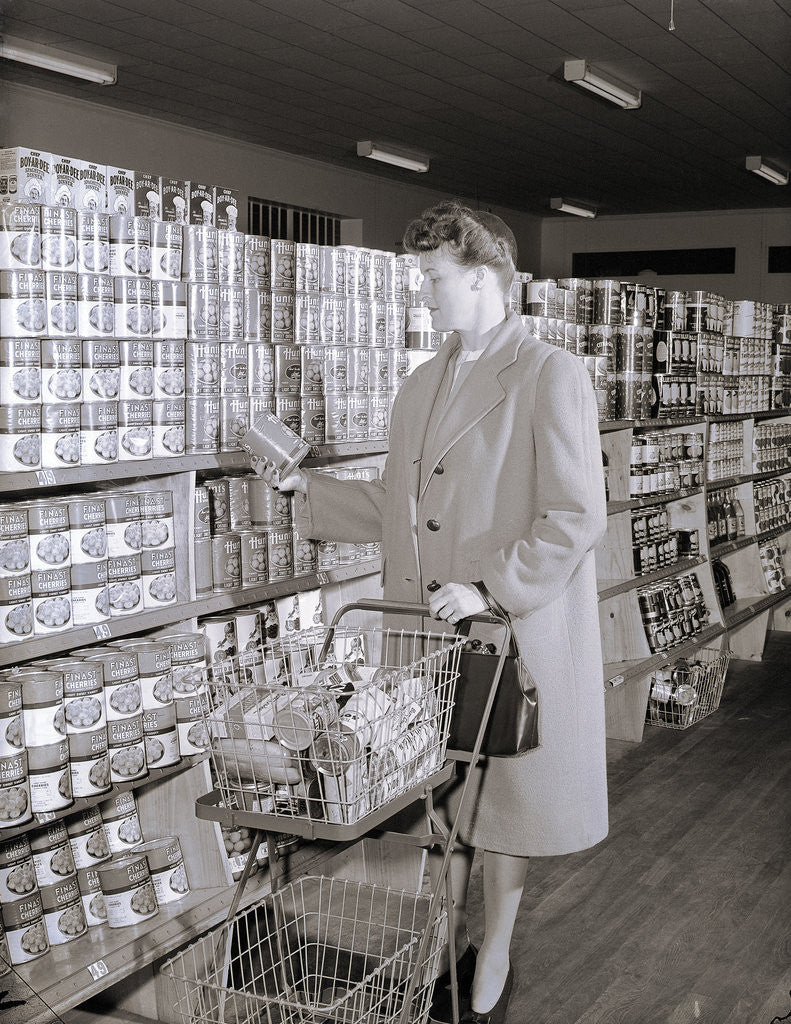 Detail of Woman Buying Food In Grocery Store by Corbis