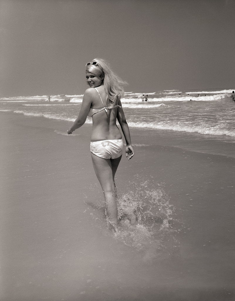 Detail of Beachgoer Looking over Her Shoulder by Anonymous