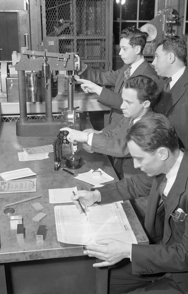 Detail of Students In School Metal Testing Lab by Anonymous