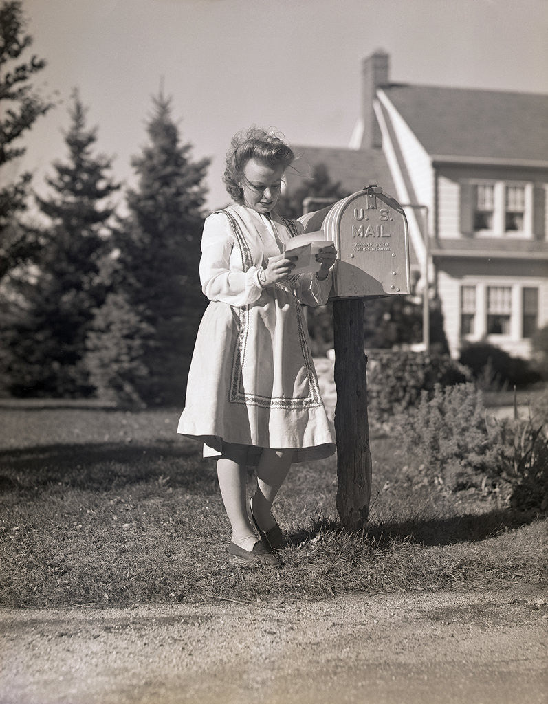 Detail of Woman Reading Mail by Mail Box by Anonymous