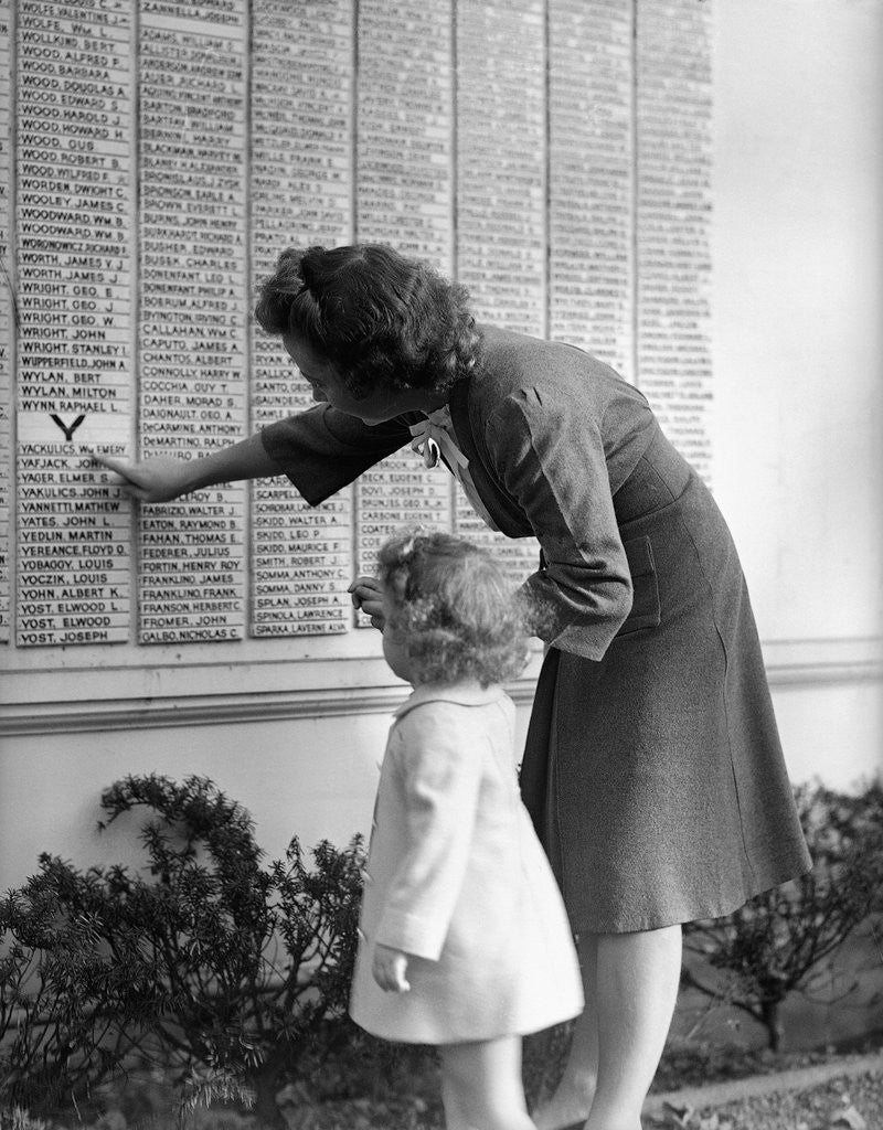 Detail of Woman And Daughter At Honor Roll Wall by Anonymous