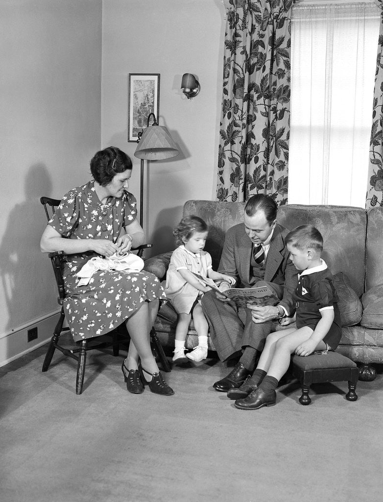 Detail of Family Sitting in Living Room by Anonymous