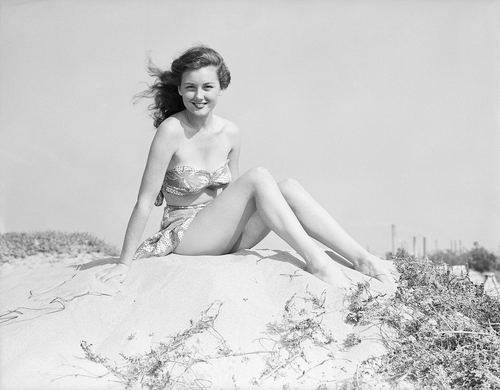 Detail of Young Woman Seated on Sand Dune by Anonymous