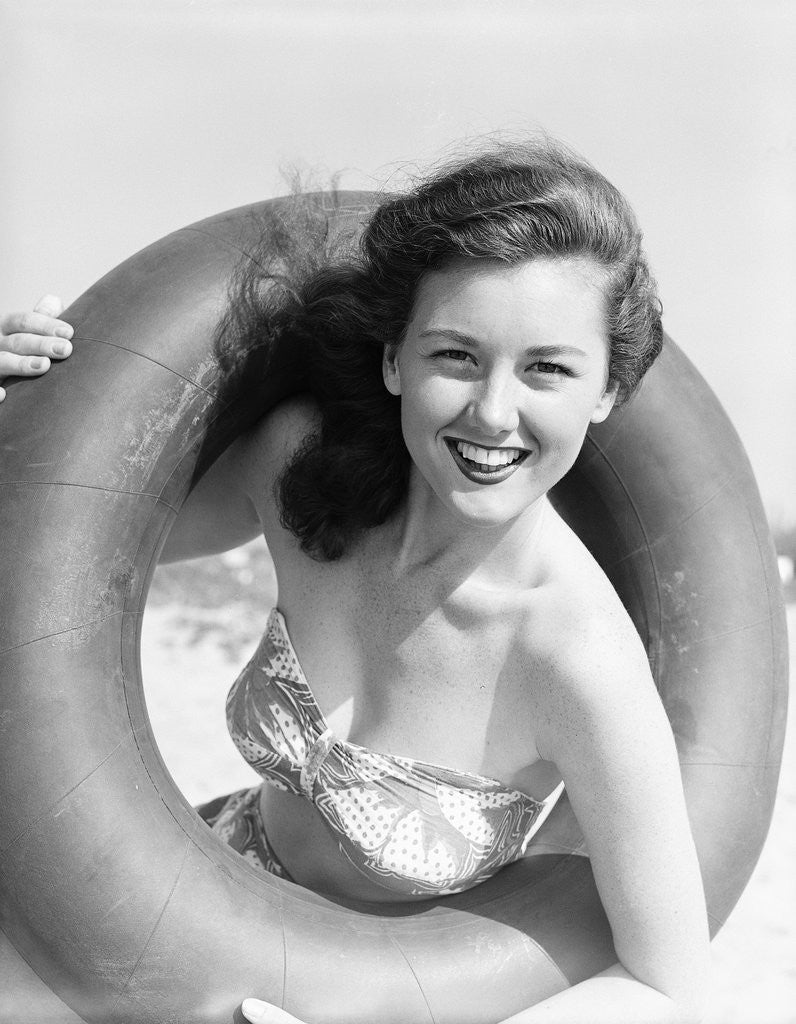 Detail of Woman with Head Through Inner Tube by Anonymous