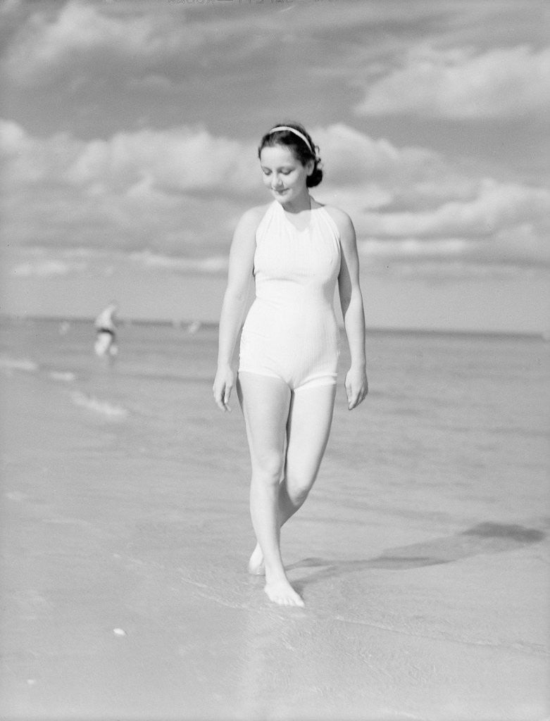 Detail of Woman Casually Strolling Along the Beach by Anonymous