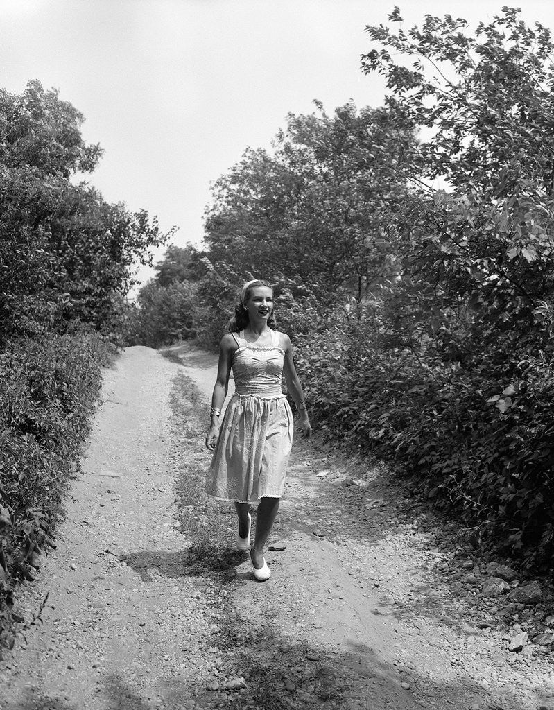 Detail of Woman Walking on Country Road by Anonymous