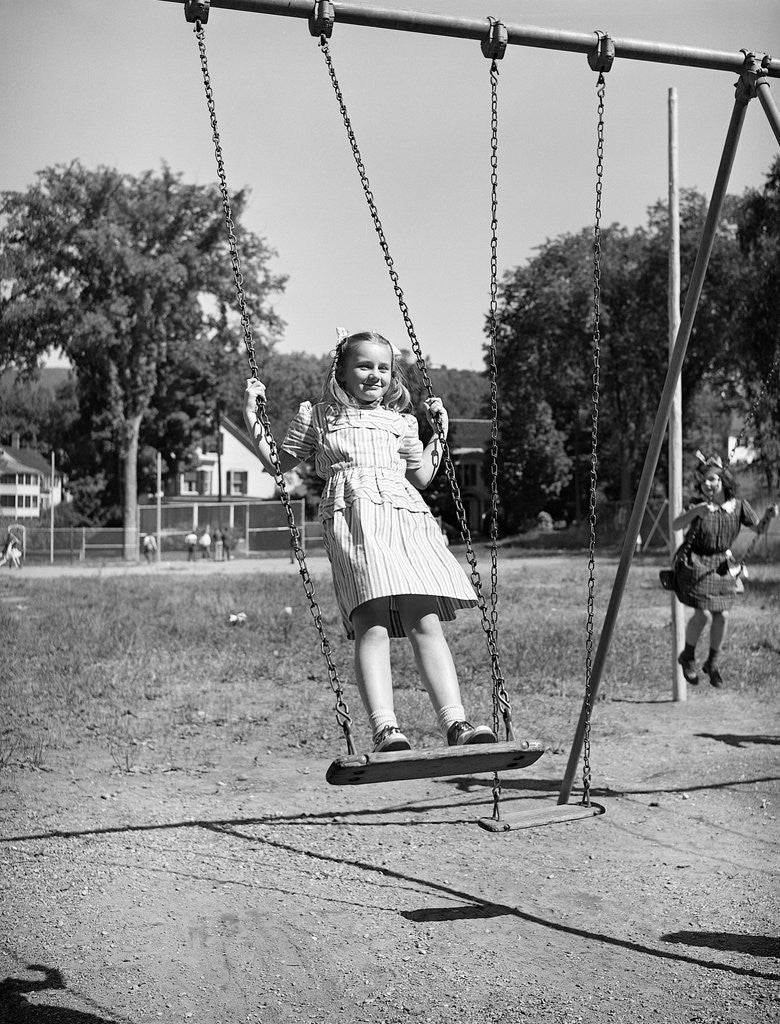 Detail of Girl Standing on Swing by Corbis