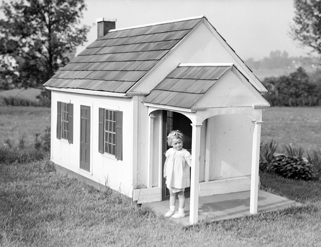 Detail of Girl Standing on Playhouse Porch in Massachusetts by Corbis