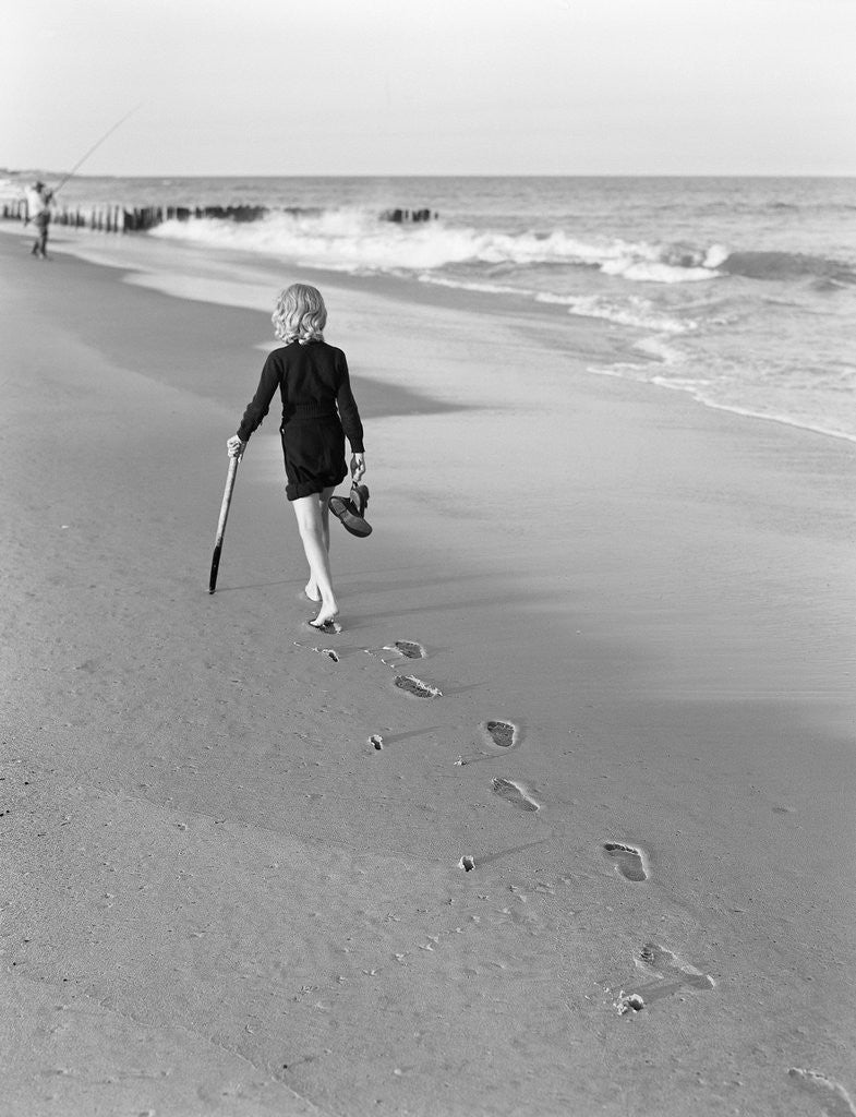 Detail of Woman Walking on Beach Leaving Footprints by Anonymous