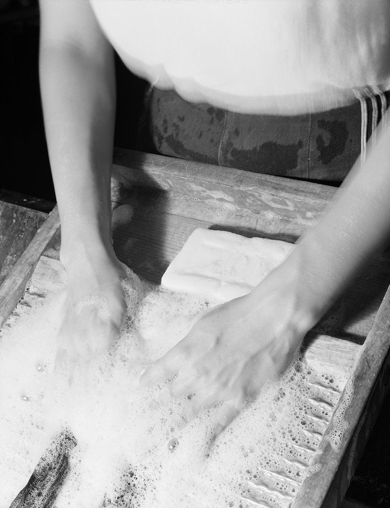 Detail of Person Using Washboard by Anonymous