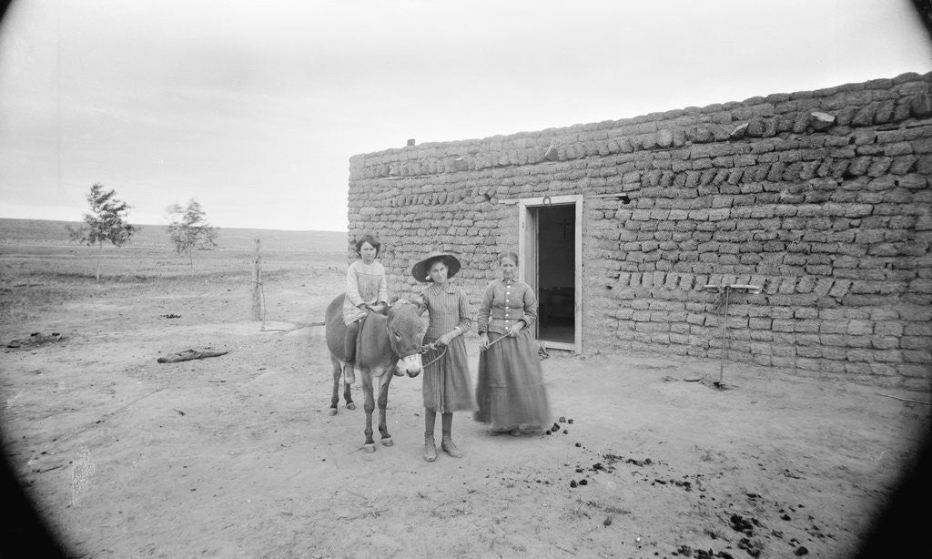 Detail of Women and Child Outside Ranch House by Anonymous