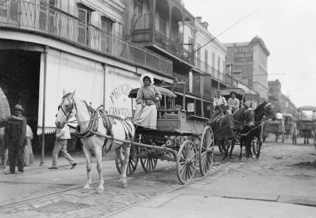 Detail of Woman Driving Horse-Drawn Wagon on Street by Anonymous