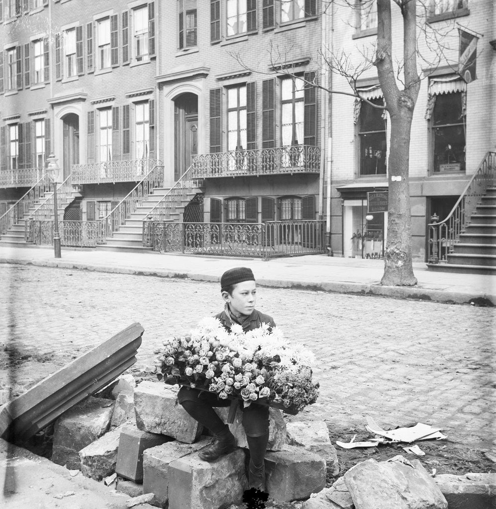Detail of Boy Selling Flowers by Corbis
