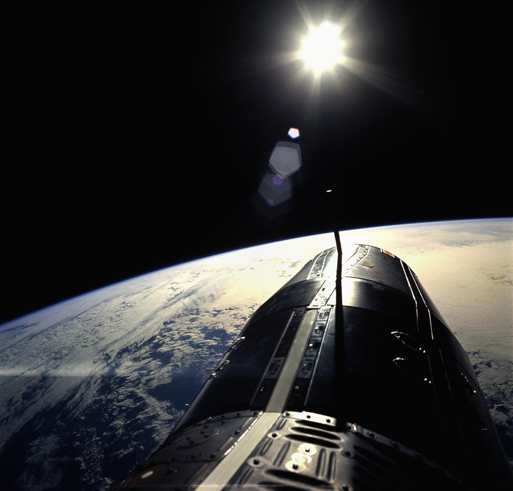 Gemini Spacecraft Orbiting the Earth by Corbis