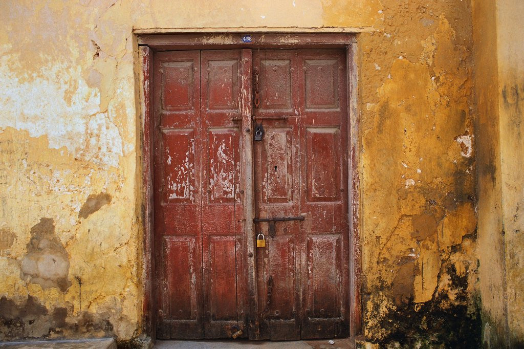 Detail of Wooden Door in Worn Wall by Anonymous