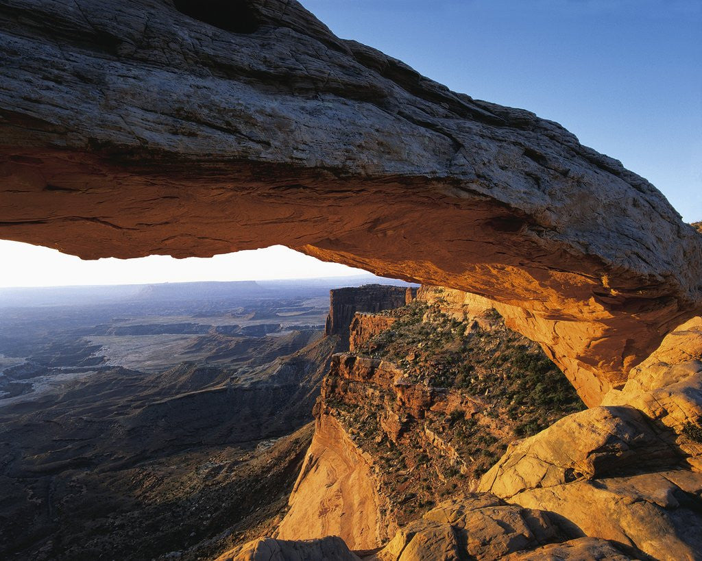 Detail of Mesa Arch Framing Landscape by Corbis