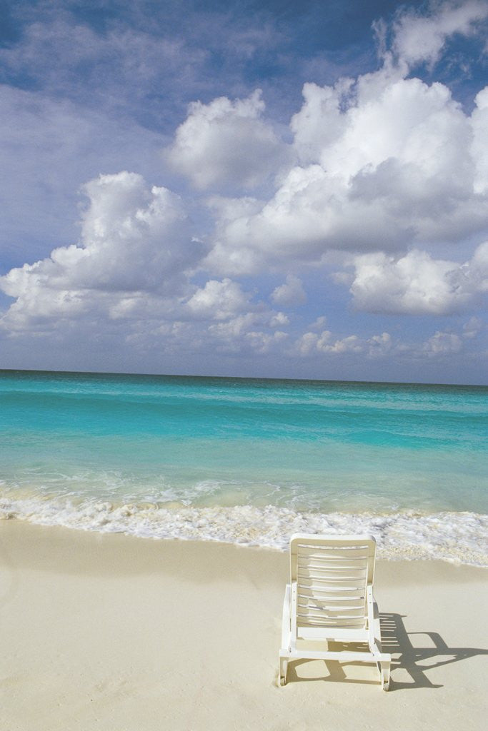 Detail of Lone Lounge Chair on Sandy Beach by Anonymous