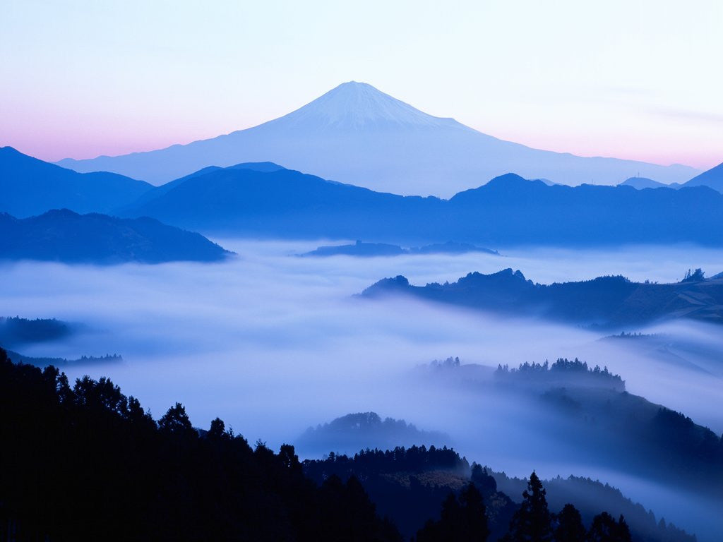 Detail of Distant view of Mount Fuji silhouetted against blue sky by Anonymous