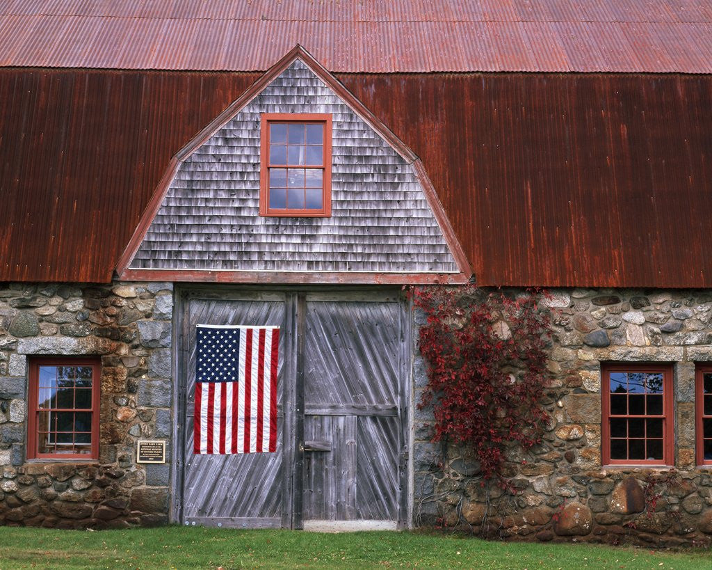 Detail of Flag Hanging on Barn Door by Corbis