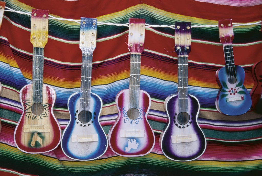 Detail of Colorful Guitars Drying by Corbis