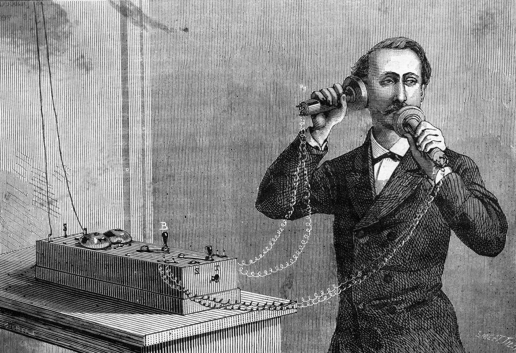 Alexander Graham Bell Using Telephone by Corbis
