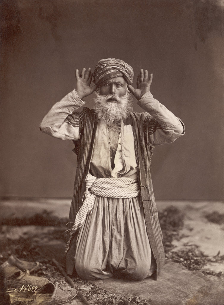 Detail of Muslim Man Poses in Prayer by Corbis