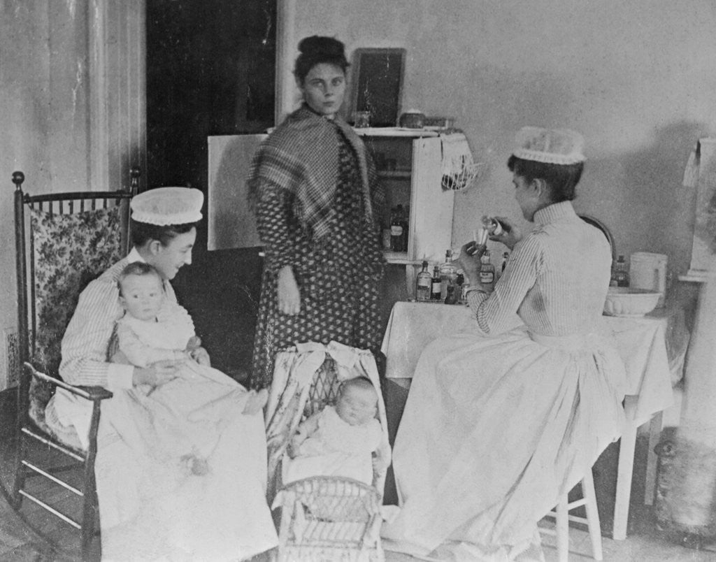 Detail of Nurses Caring for Children in Hospital by Corbis