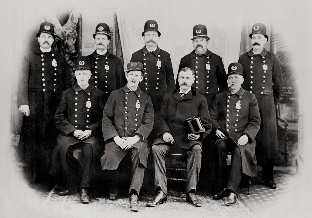 Detail of Police Officers Posing Together by Corbis