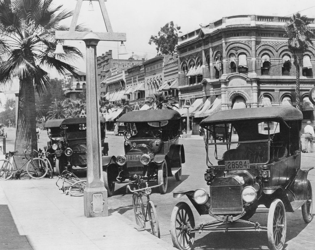 Detail of Cars Parked Alongside Street by Anonymous