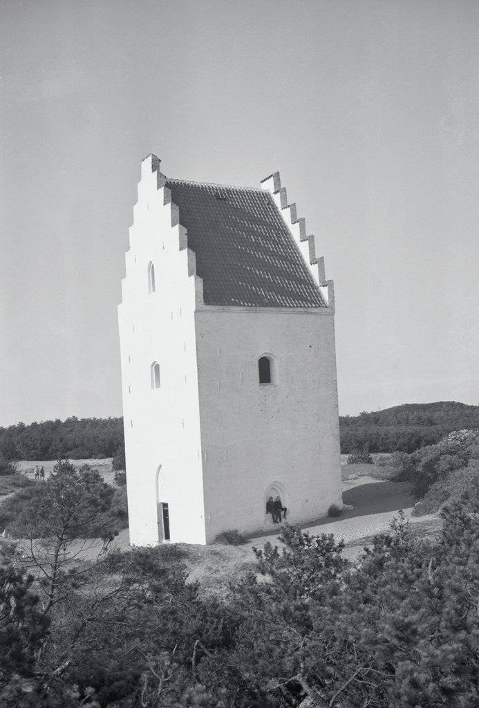 Detail of Couple Relaxing in Window of Large Sand Engulfed Church by Anonymous