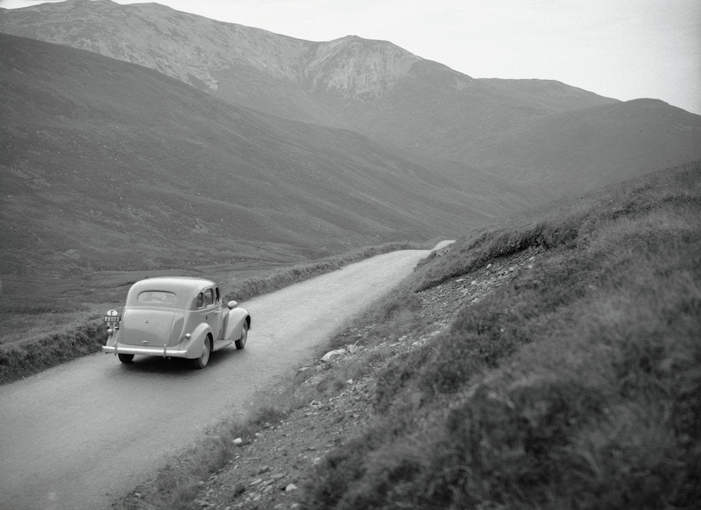 Detail of Car Traveling in the Highlands by Corbis