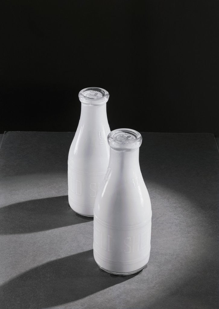 Detail of Two Quarts of Milk in Glass Bottles by Corbis