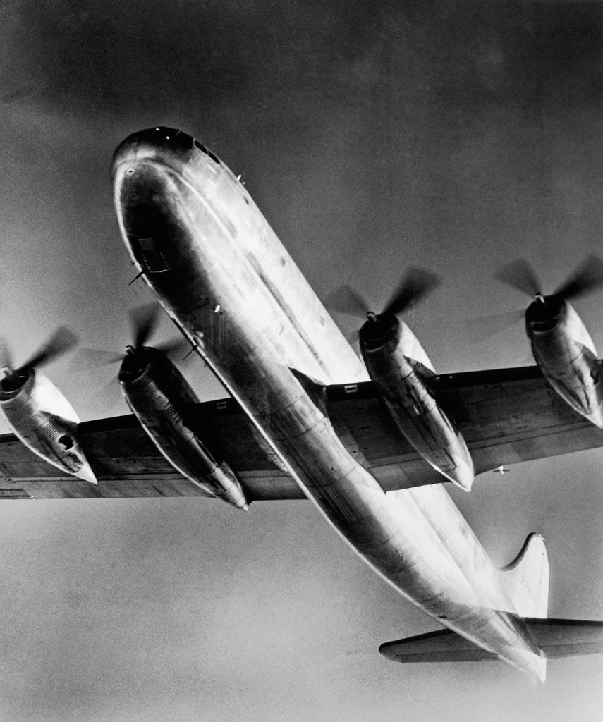 Detail of View of Large Airplane in Flight by Corbis