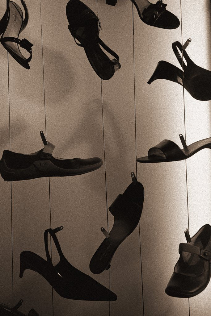 Detail of Ladies Shoes Hanging on Wire by Anonymous