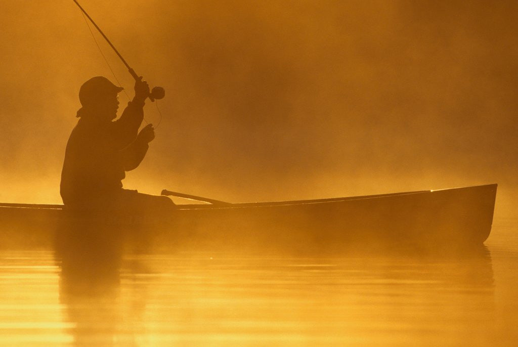 Detail of Fly Fishing from a Canoe by Corbis