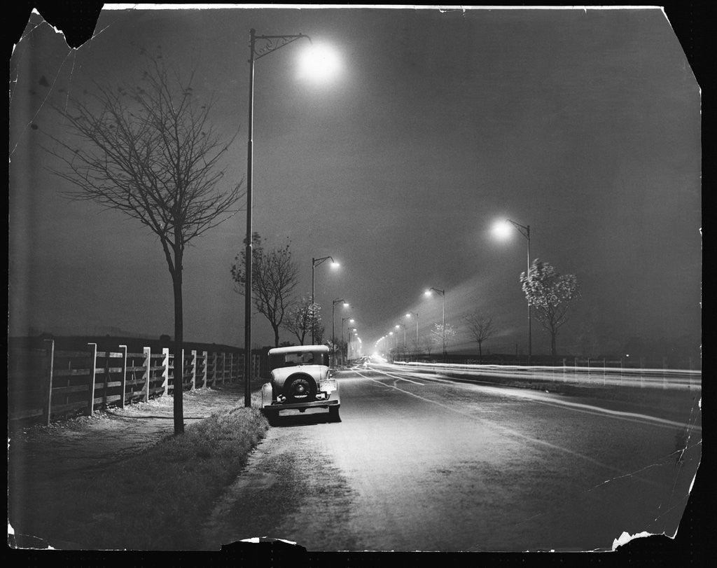 Detail of Car on a Lit Road by Anonymous