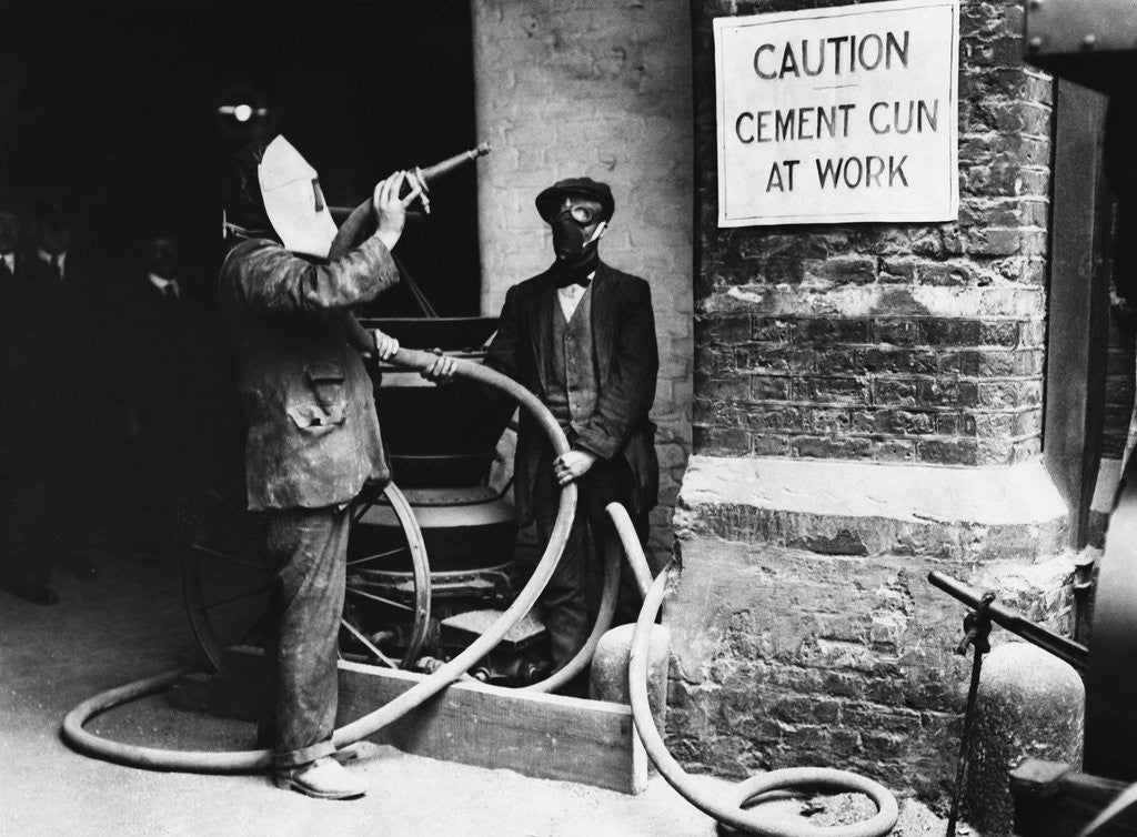 Detail of Construction Workers Spraying Cement on Roof with Concrete Gun by Anonymous