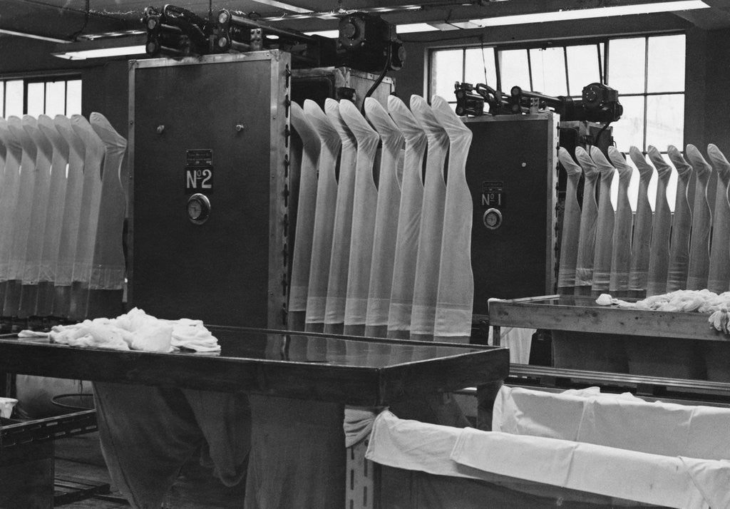 Detail of Stockings at a Clothing Factory by Corbis