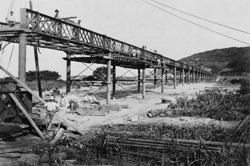 Detail of Men Build a Railway Bridge by Corbis