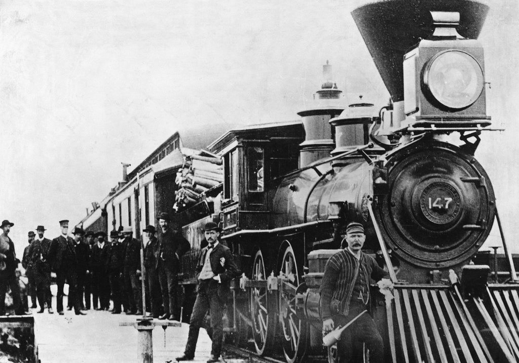 Detail of Men and Canadian Steam Locomotive by Corbis