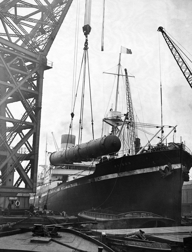 Detail of Crane Lifting Oil Refinery Tower from Cargo Ship by Anonymous