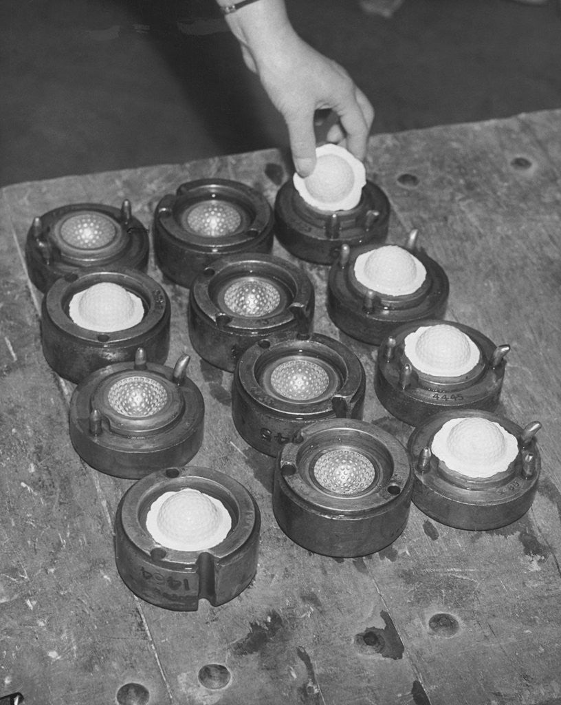 Detail of Golf Balls in Molds by Anonymous