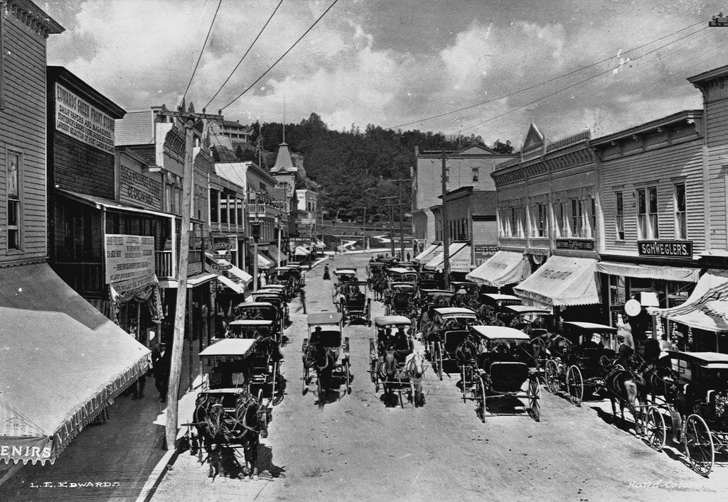 Detail of Horse-Drawn Carriages and Storefronts on Mackinac Island by Corbis