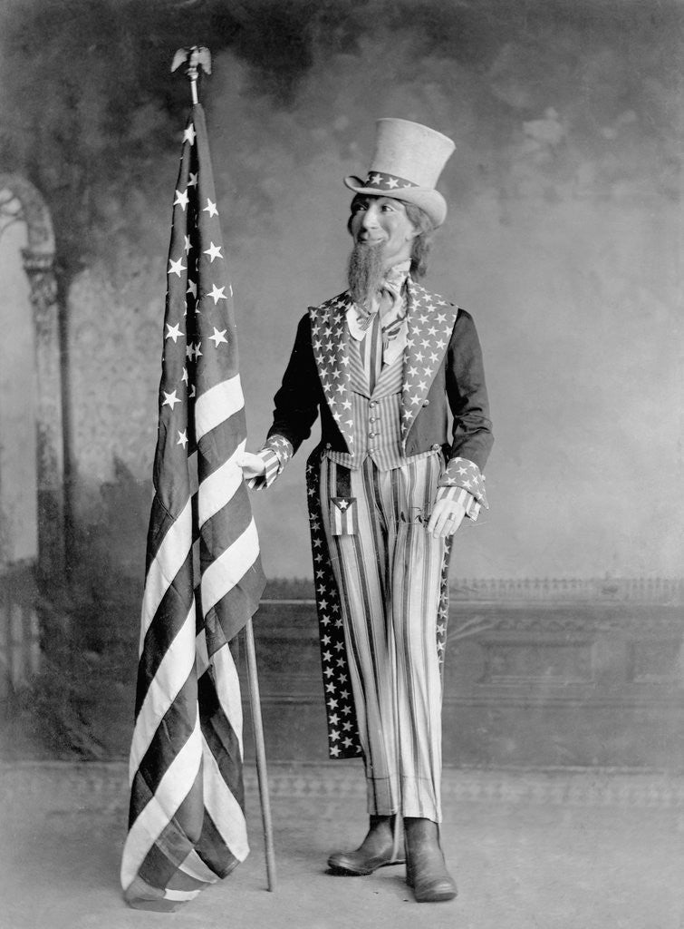 Detail of Wooden Uncle Sam and the American Flag by Corbis