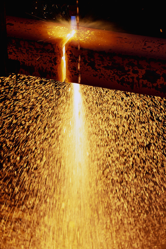 Detail of Acetylene Torch Cutting Steel Beams by Corbis
